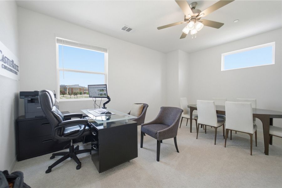 Representative furnished interior of a home built from the Kahn by CastleRock Communities in Municipal Drive Townhomes, Leander (Image 17).