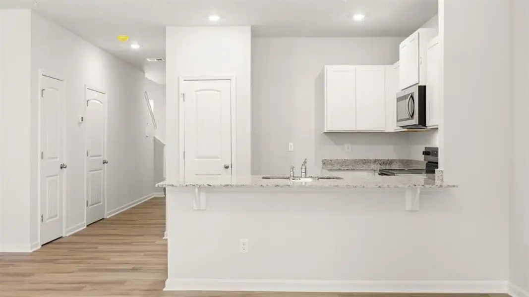 Furnished interior view inside a new home in Roseleigh Park, Douglasville (Image 3).