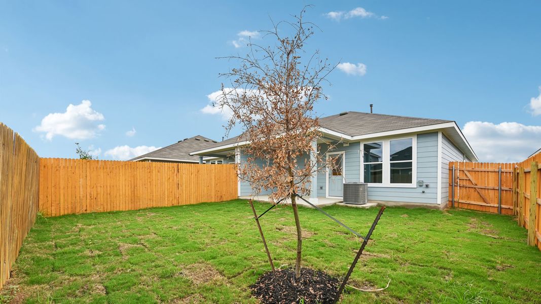 Exterior details and patio area of a home in Wayside, Uhland (Image 21).