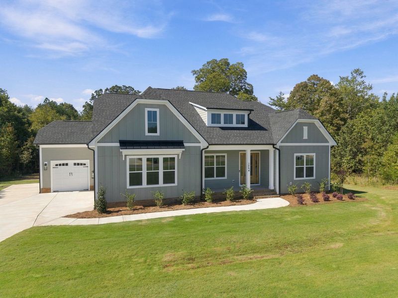 Front exterior of a new home in Shepherds Trace, Clover, SC, highlighting curb appeal (Image 29). Front exterior of a new home in Shepherds Trace, Clover, SC, highlighting curb appeal (Image 29).