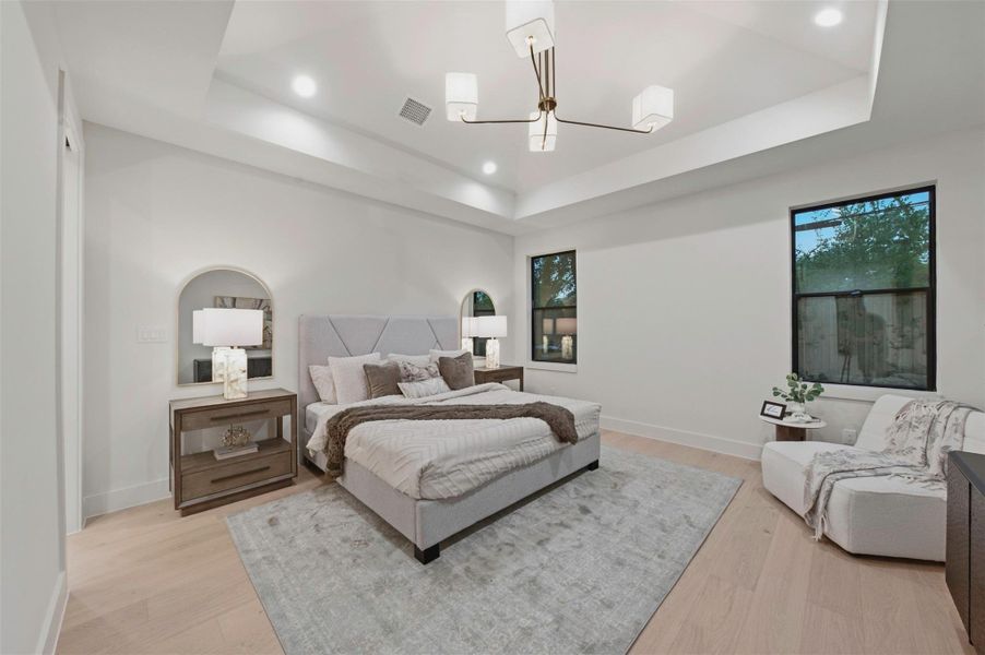 Private primary suite offers a peaceful retreat with generous proportions and thoughtfully selected finishes.