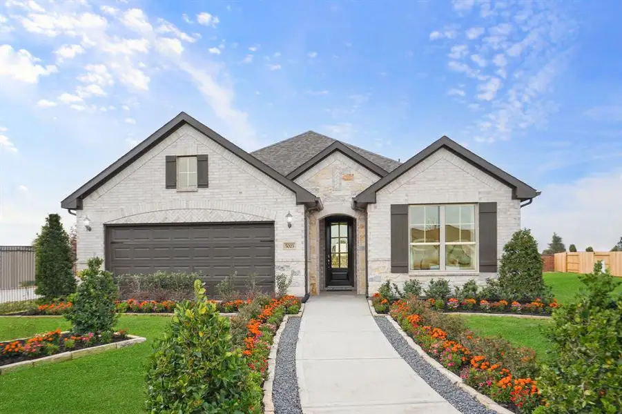 Front exterior of a new home in Devonshire, Forney, TX, highlighting curb appeal (Image 19). Front exterior of a new home in Devonshire, Forney, TX, highlighting curb appeal (Image 19).
