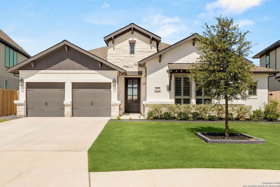 Front exterior of a new home in Meadows Of Mill Creek 60', Seguin, TX, highlighting curb appeal (Image 19).