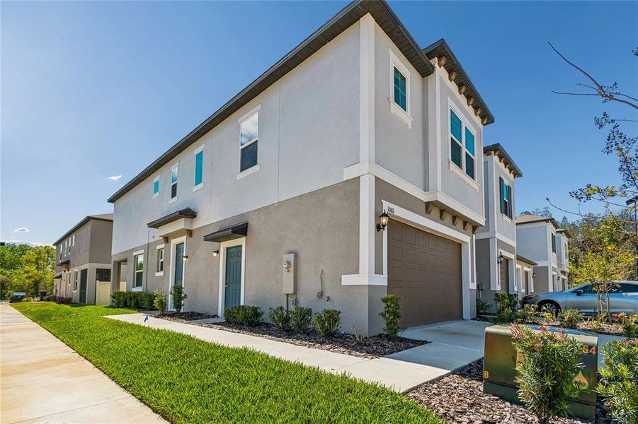 Front exterior of a new home in , Tampa, FL, highlighting curb appeal (Image 2). Front exterior of a new home in , Tampa, FL, highlighting curb appeal (Image 2).