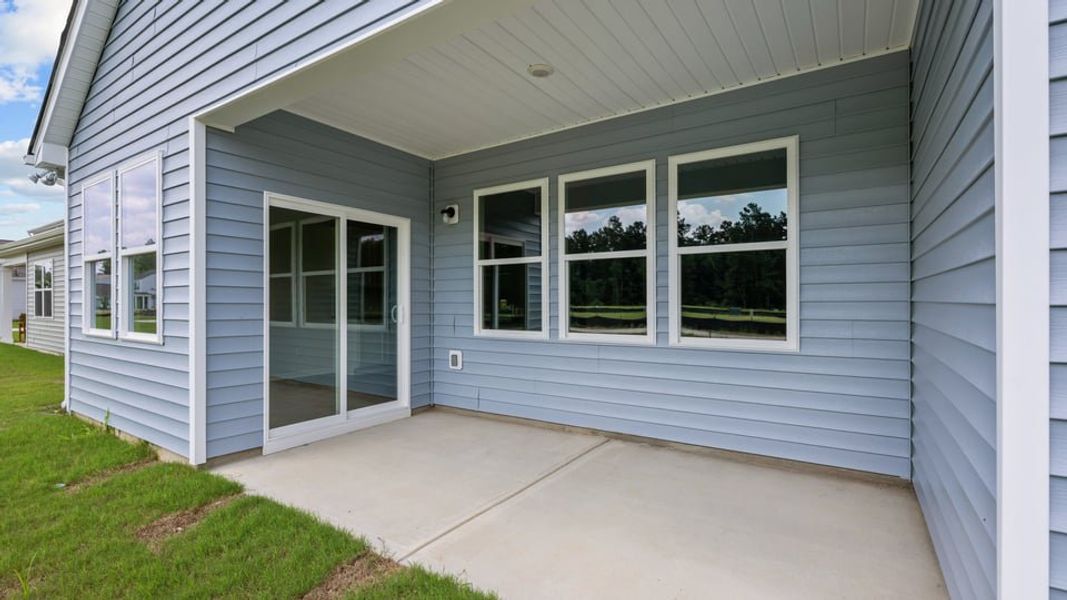 Exterior details and patio area of a home in West New Bern, New Bern (Image 20).