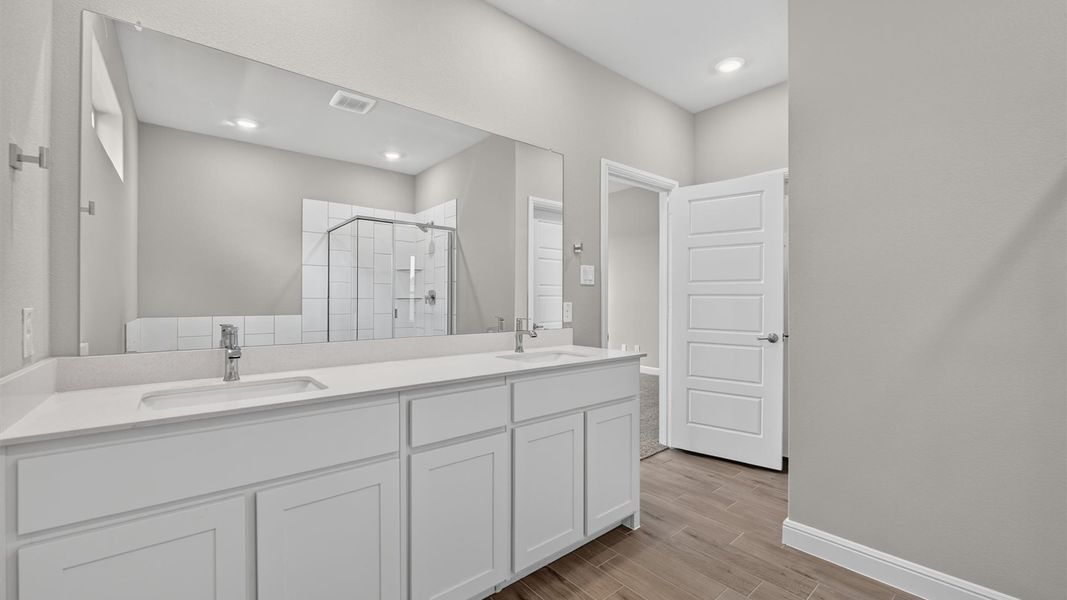 Representative furnished interior of a home built from the Desert Willow by D.R. Horton in Treeline, Justin (Image 13).