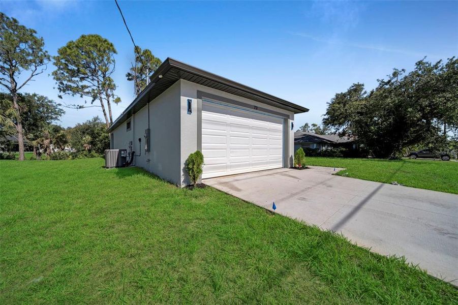 Front exterior of a new home in , Port Charlotte, FL, highlighting curb appeal (Image 16).