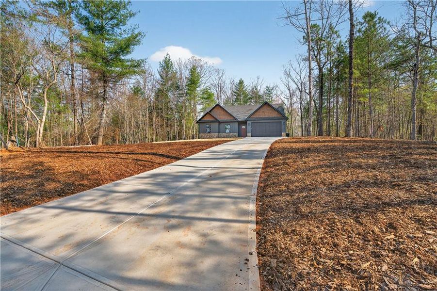 Front exterior of a new home in , Ellijay, GA, highlighting curb appeal (Image 24).