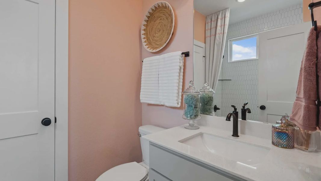 Representative furnished interior of a home built from the Acadia by Chesmar Homes in Elyson 50's, Katy (Image 37).