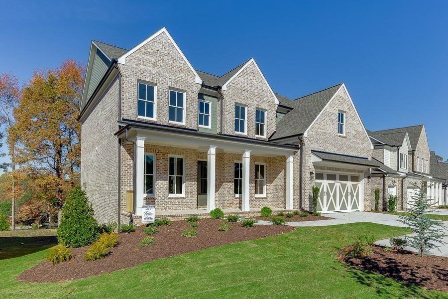 Front exterior of a new home in , Buford, GA, highlighting curb appeal (Image 2). Front exterior of a new home in , Buford, GA, highlighting curb appeal (Image 2).