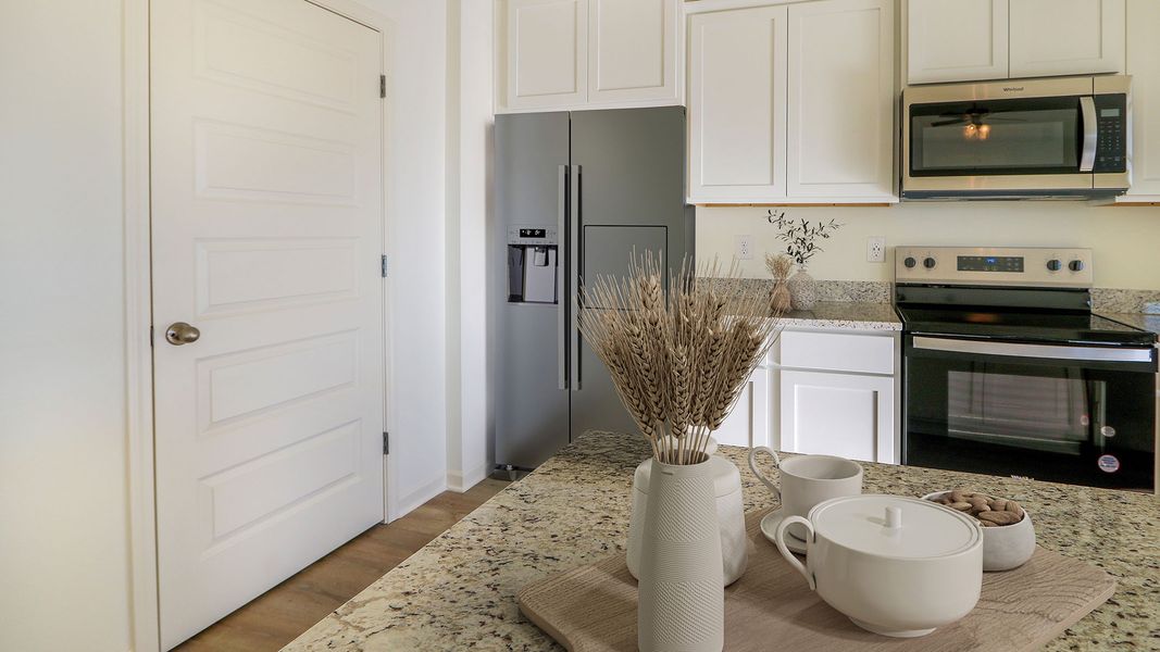 Furnished interior view inside a new home in Magnolia at the Bluffs Phase 3, Freeport (Image 4). Furnished interior view inside a new home in Magnolia at the Bluffs Phase 3, Freeport (Image 4).