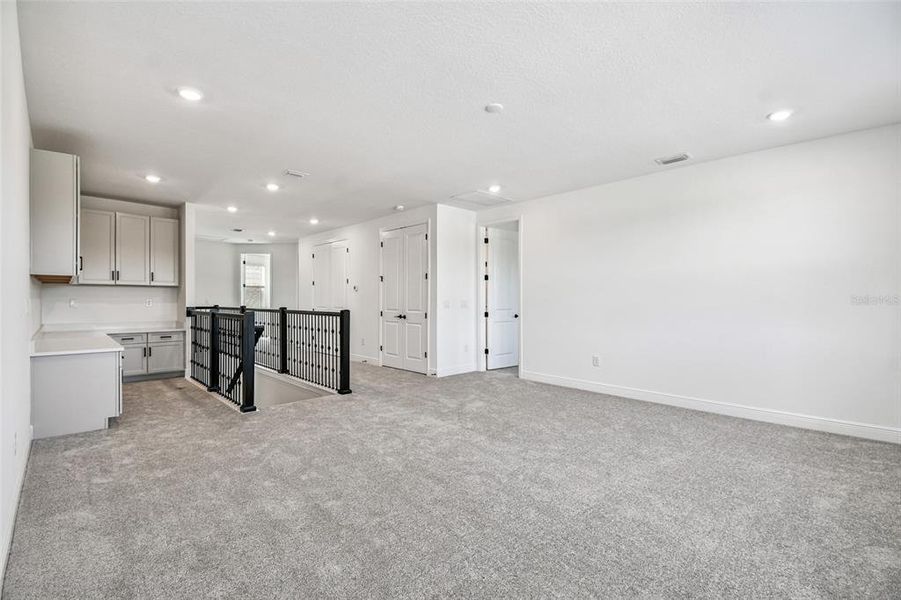 Spacious, unfurnished interior of a new home in Creeks Edge at Twin Rivers, Parrish (Image 45).