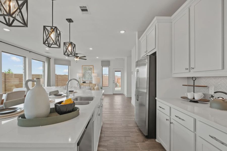Representative furnished interior of a home built from the Capeside by Chesmar Homes in Elyson Courtyard Collection, Katy (Image 7).