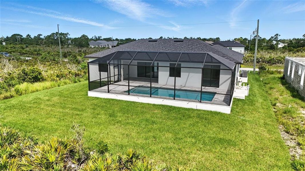 Exterior details and patio area of a home in , Port Charlotte (Image 28).