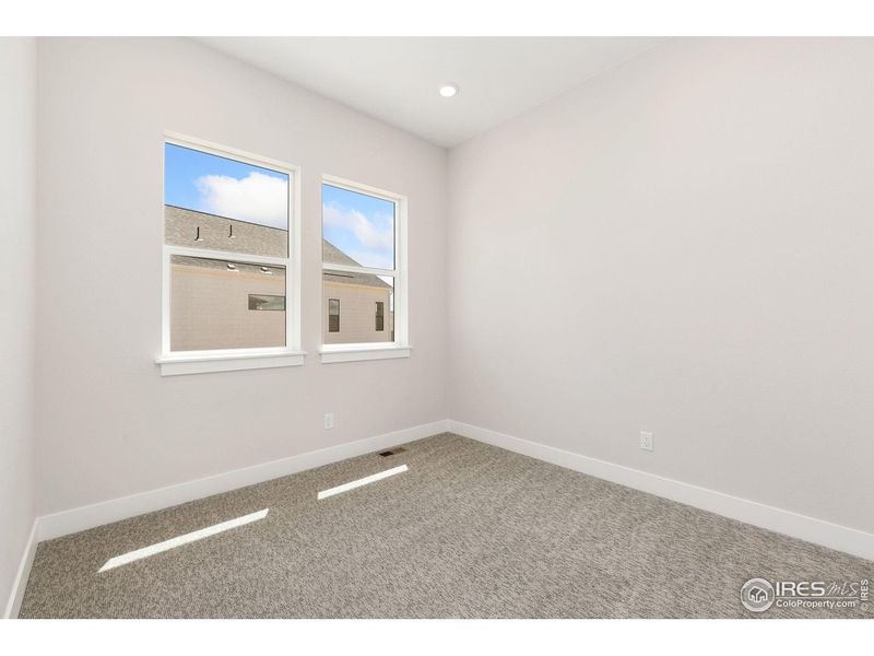 Spacious, unfurnished interior of a new home in Kitchel Lake at Serratoga Falls, Timnath (Image 13).