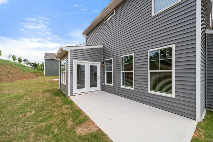 Front exterior of a new home in Chandler Ridge, McLeansville, NC, highlighting curb appeal (Image 19).