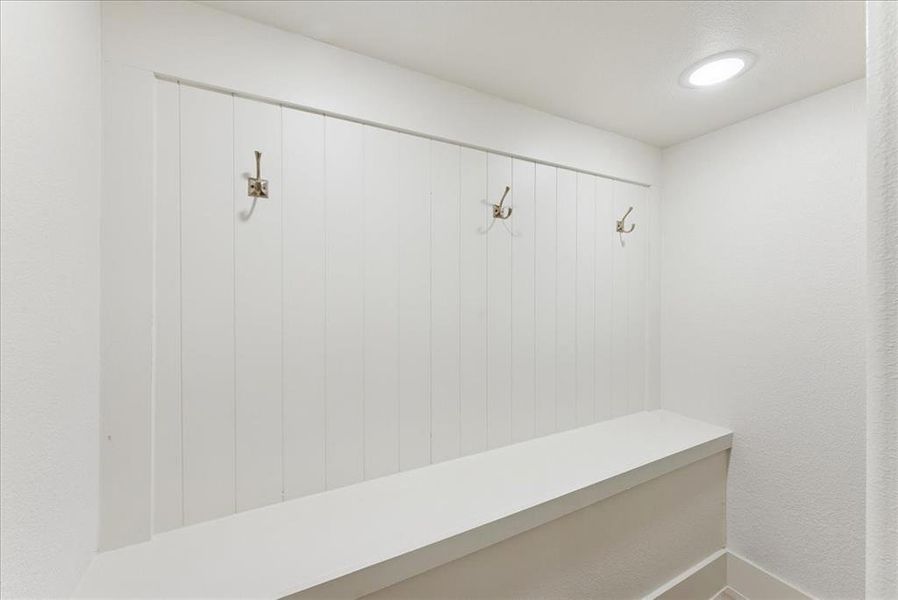 Mudroom with recessed lighting