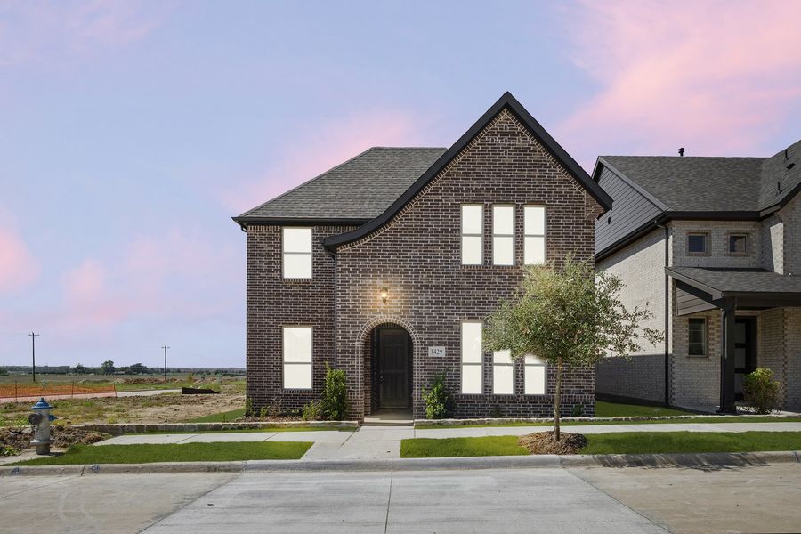 Front exterior of a new home in Hillside Village 40s, Celina, TX, highlighting curb appeal (Image 1).