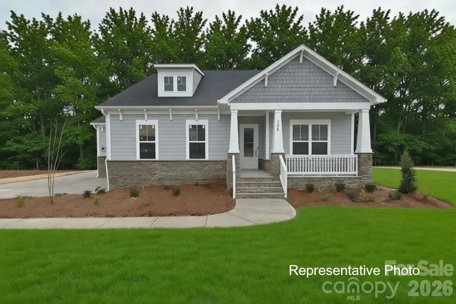Front exterior of a new home in Edmunds Farm, Clover, SC, highlighting curb appeal (Image 1). Front exterior of a new home in Edmunds Farm, Clover, SC, highlighting curb appeal (Image 1).