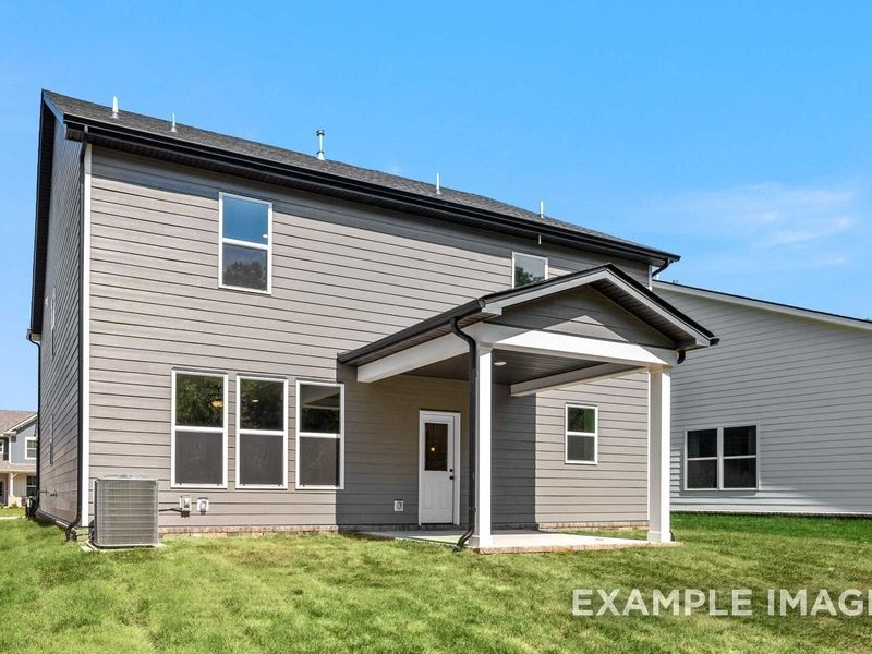 Exterior details and patio area of a home in Woods Crossing, Gallatin (Image 32).