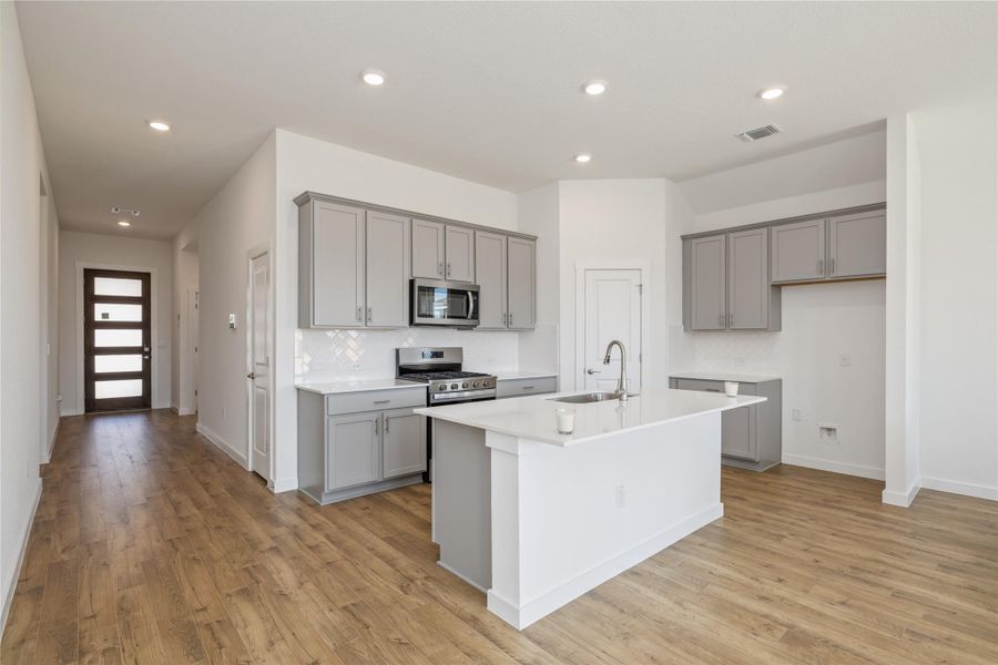 Furnished interior view inside a new home in Rosenbusch Ranch, Leander (Image 5). Furnished interior view inside a new home in Rosenbusch Ranch, Leander (Image 5).