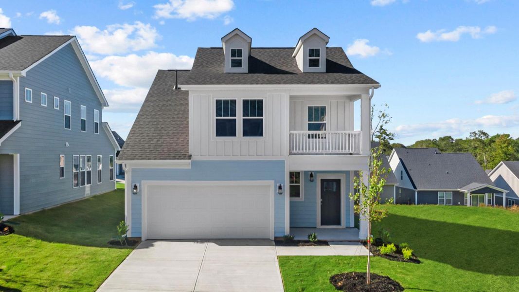 Representative exterior photo of a completed home built from the Freesia by DRB Homes in Farms at Bellingham, Mooresville, NC (Image 6). Representative exterior photo of a completed home built from the Freesia by DRB Homes in Farms at Bellingham, Mooresville, NC (Image 6).
