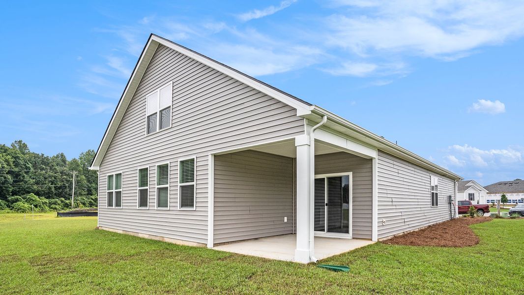 Exterior details and patio area of a home in Winfield Farms, Myrtle Beach (Image 3).