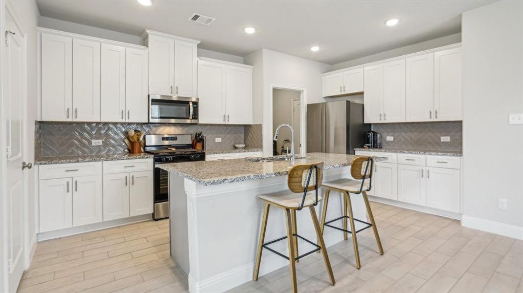 Furnished interior view inside a new home in Venetian, Weston (Image 17).