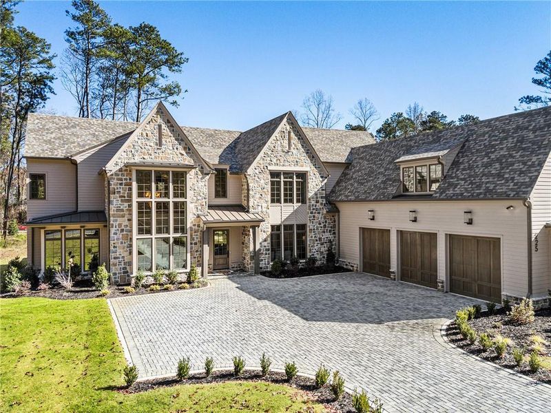 Front exterior of a new home in , Roswell, GA, highlighting curb appeal (Image 2). Front exterior of a new home in , Roswell, GA, highlighting curb appeal (Image 2).