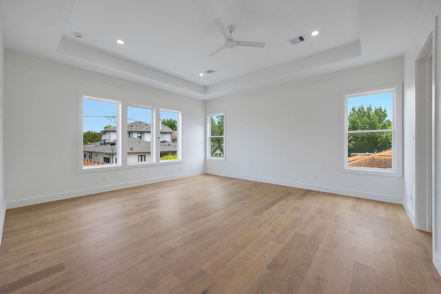Upstairs, the primary suite is light-filled and spacious, with beautiful wood floors carried throughout the home. Upstairs, the primary suite is light-filled and spacious, with beautiful wood floors carried throughout the home.