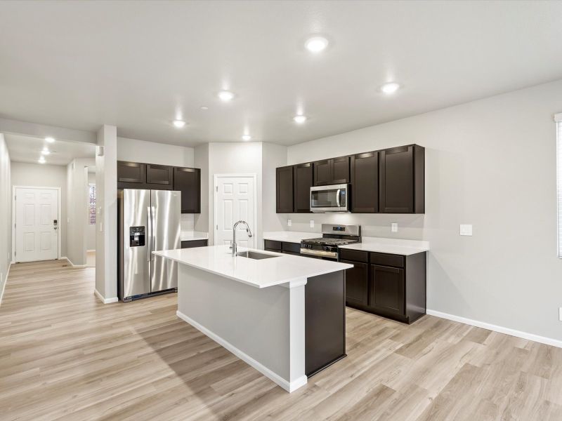Furnished interior view inside a new home in Buffalo Highlands: The Flora Collection, Commerce City (Image 4). Furnished interior view inside a new home in Buffalo Highlands: The Flora Collection, Commerce City (Image 4).