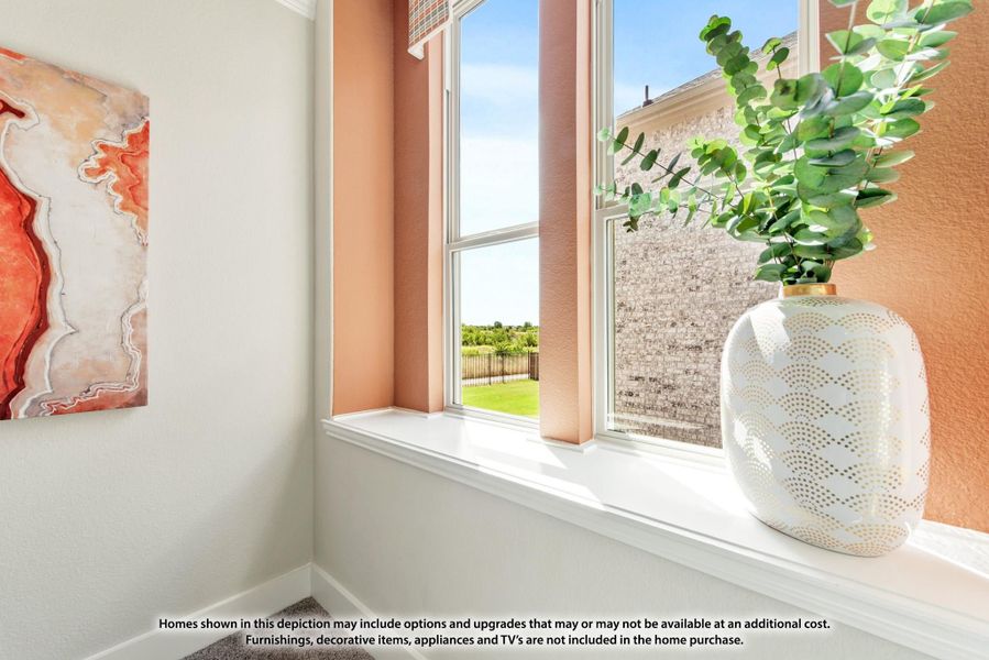 White window sill with decorative vase and green plant, overlooking a backyard with orange accent walls nearby. White window sill with decorative vase and green plant, overlooking a backyard with orange accent walls nearby.