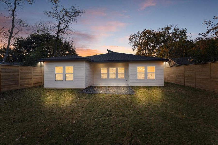 Back of house featuring a patio and a fenced backyard