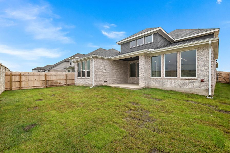 Exterior details and patio area of a home in Blackhawk in Pflugerville, Pflugerville (Image 3).