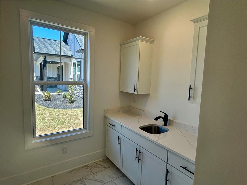 Furnished interior view inside a new home in Edwards Ridge, Central (Image 14).