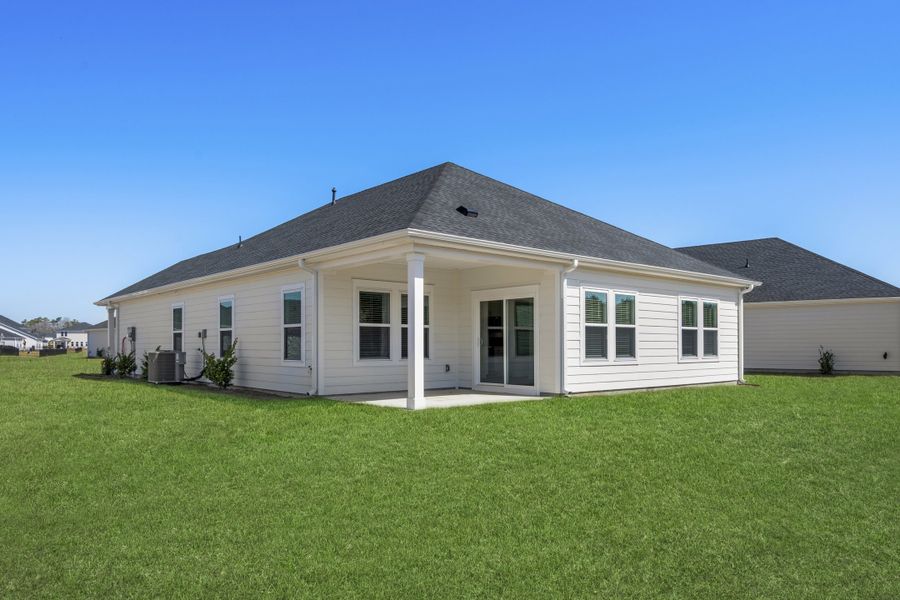 Exterior details and patio area of a home in Waterside - Coastline Series, Longs (Image 2).