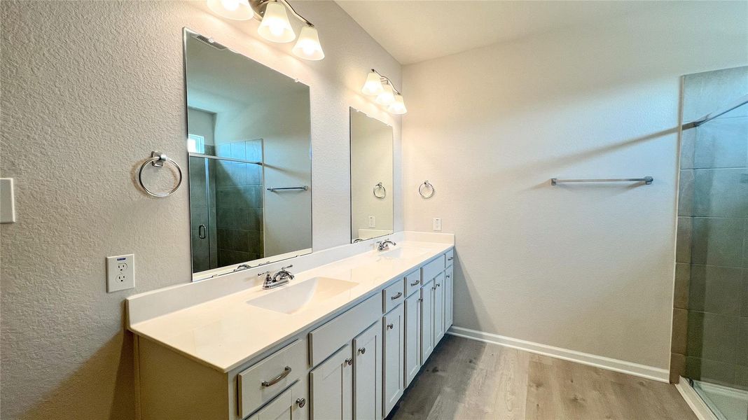 The Kettering II- Primary Bathroom with Dual Vanities and Walk-In Shower