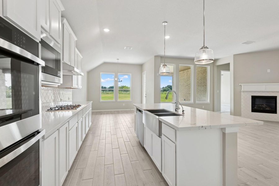 Stunning kitchen with quartz counters and white cabinets Stunning kitchen with quartz counters and white cabinets