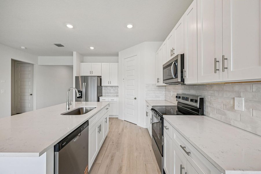 Furnished interior view inside a new home in Brystol at Wylder - Reserve Series, Port St. Lucie (Image 6).