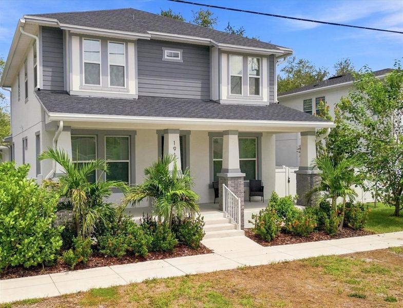 Front exterior of a new home in , Tampa, FL, highlighting curb appeal (Image 25). Front exterior of a new home in , Tampa, FL, highlighting curb appeal (Image 25).