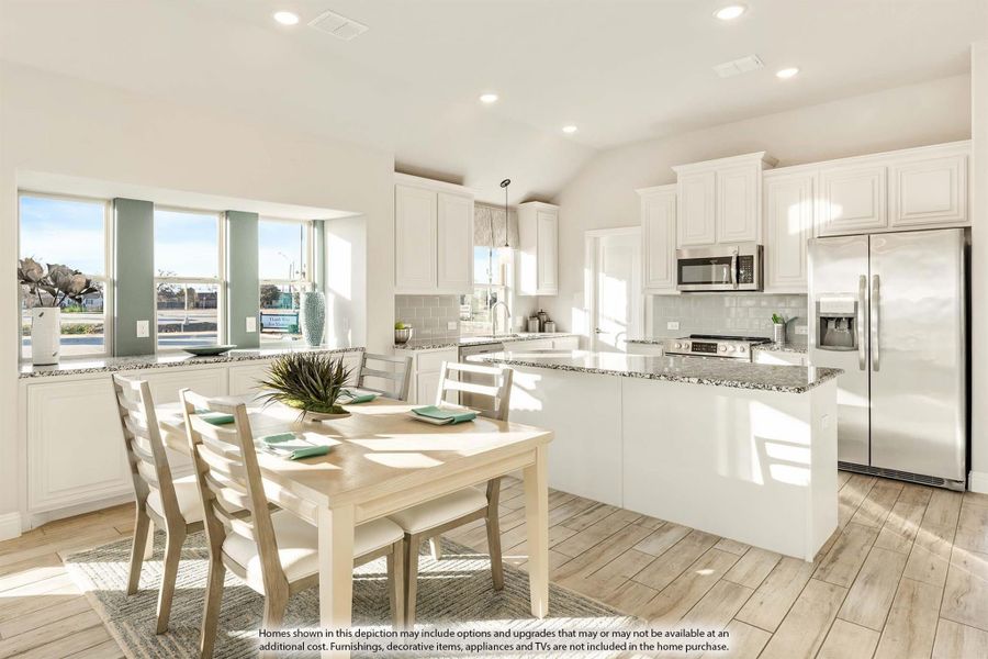 Open kitchen and dining area with white cabinets, granite counters, stainless appliances, and light wood floors Open kitchen and dining area with white cabinets, granite counters, stainless appliances, and light wood floors