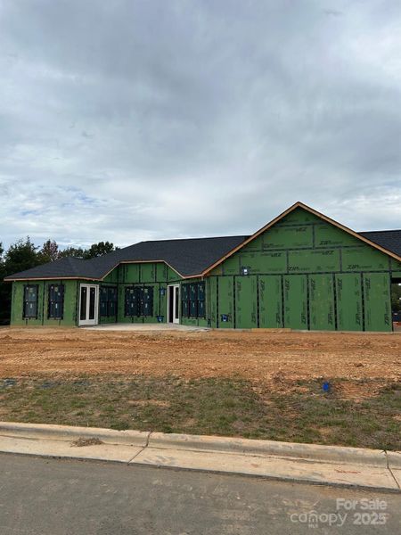 In-progress construction of a new home in The Courtyards at Hodges Farm, Charlotte, NC (Image 7).