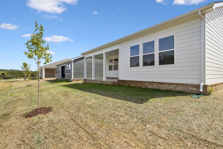Front exterior of a new home in Cedars of Cane Ridge | 55+ Community, Antioch, TN, highlighting curb appeal (Image 27).