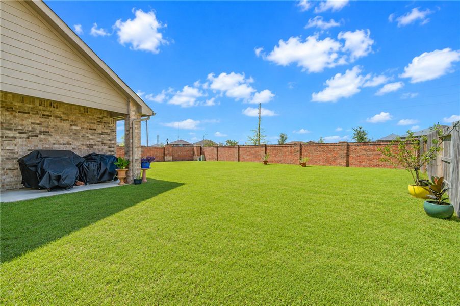 Exterior details and patio area of a home in , Katy (Image 3). Exterior details and patio area of a home in , Katy (Image 3).