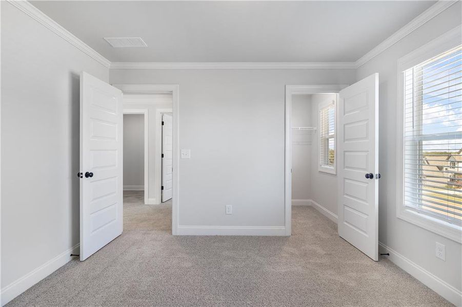 Spacious, unfurnished interior of a new home in Calgary Downs, Winder (Image 14).