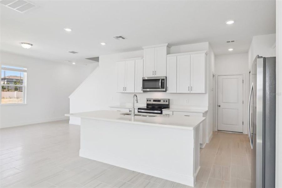 Furnished interior view inside a new home in Cyrene at Minneola - Villas, Montverde (Image 12).