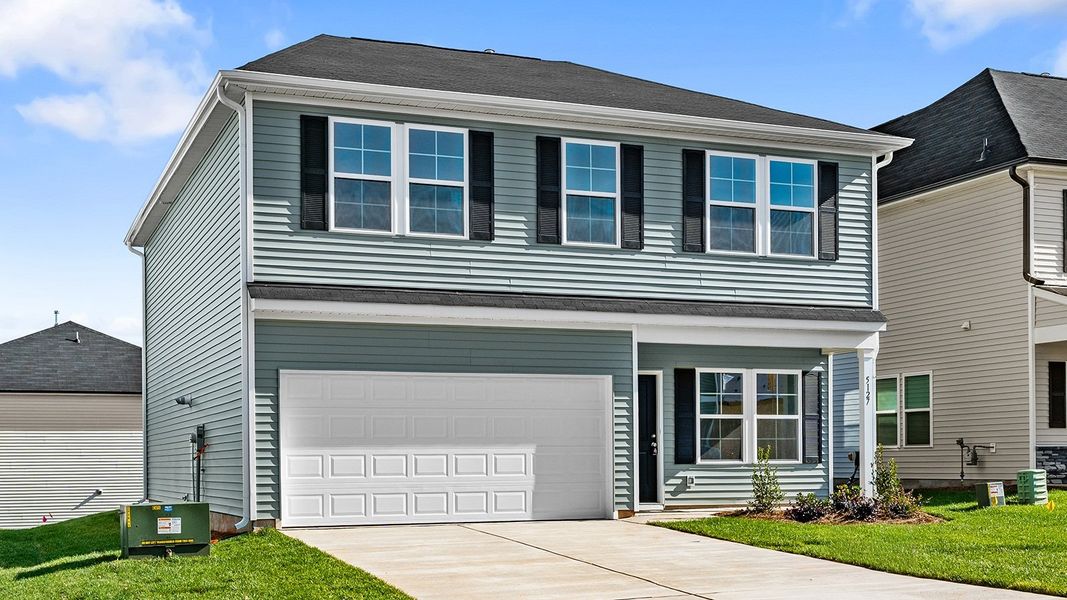 Front exterior of a new home in Bell West, Kernersville, NC, highlighting curb appeal (Image 2).