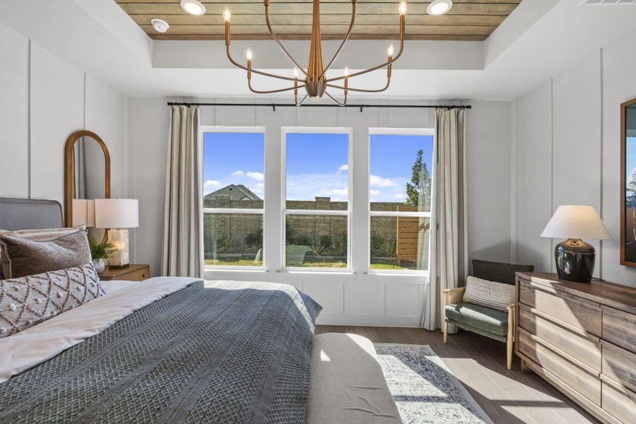 Representative furnished interior of a home built from the Aubrey by Chesmar Homes in Sienna, Missouri City (Image 44).