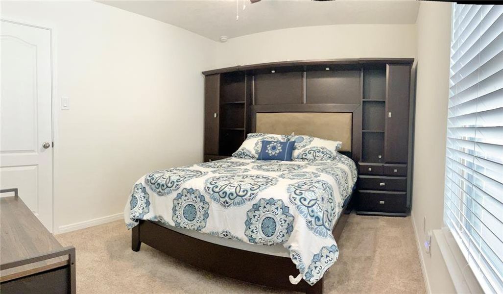 Secondary bedroom is large enough to accommodate queen size bed and furniture.