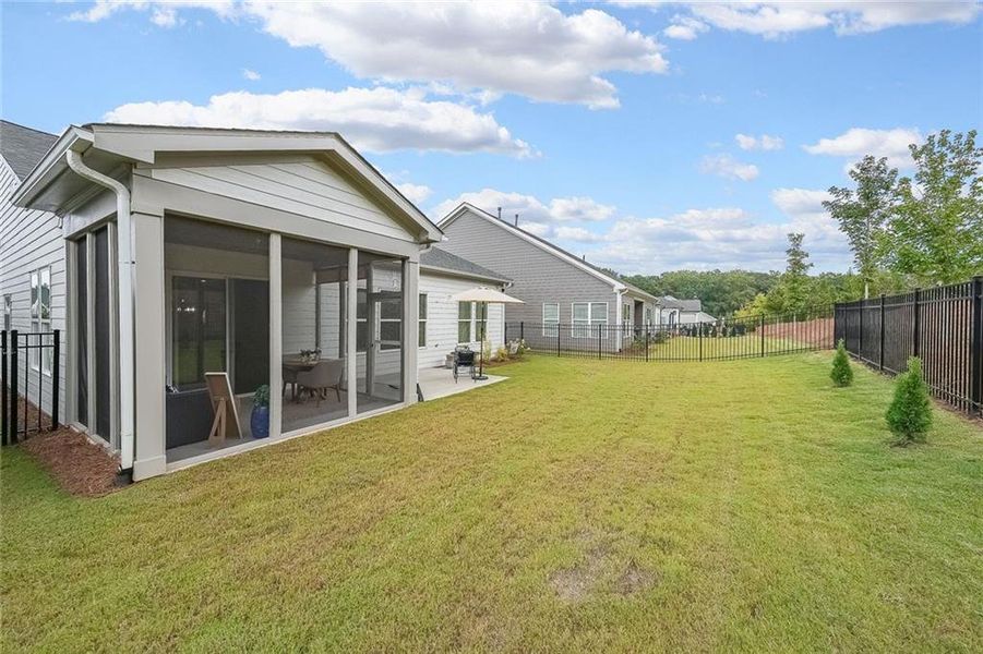 Exterior details and patio area of a home in The Reserve at Bells Ferry, Kennesaw (Image 27).
